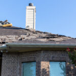 Tearing Off The Old Roof for Alpha Roofing Roof Replacement in Round Rock, TX