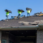 Tearing Off The Old Roof for Alpha Roofing Roof Replacement in Round Rock, TX