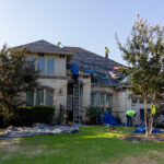 Installing the new roofing materials - Alpha Roofing Roof Replacement in Round Rock, TX