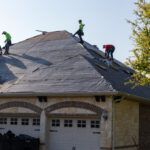 Installing the new roofing materials - Alpha Roofing Roof Replacement in Round Rock, TX