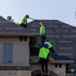 Installing the new roofing materials - Alpha Roofing Roof Replacement in Round Rock, TX