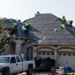 Installing the new roofing materials - Alpha Roofing Roof Replacement in Round Rock, TX